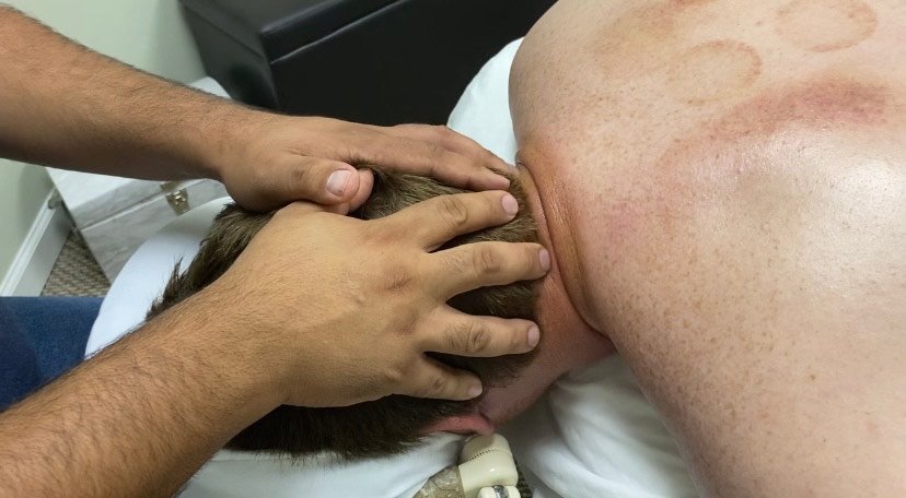 scalp massage in Raleigh Step Above Massage